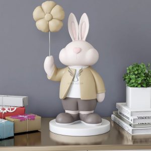 Tượng chú thỏ cầm hoa trang trí CD1477Tượng chú thỏ cầm hoa trang trí CD1477